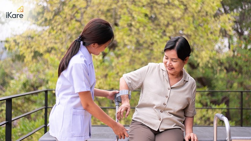 Nurse help senior woman to walk