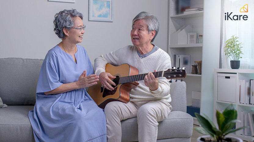 Senior Couple Playing Guitar