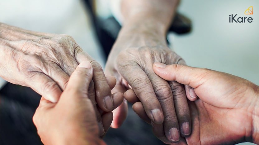 Close up Hands of Helping Hands Elderly Home Care