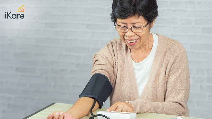 Senior Woman Measuring Blood Pressure