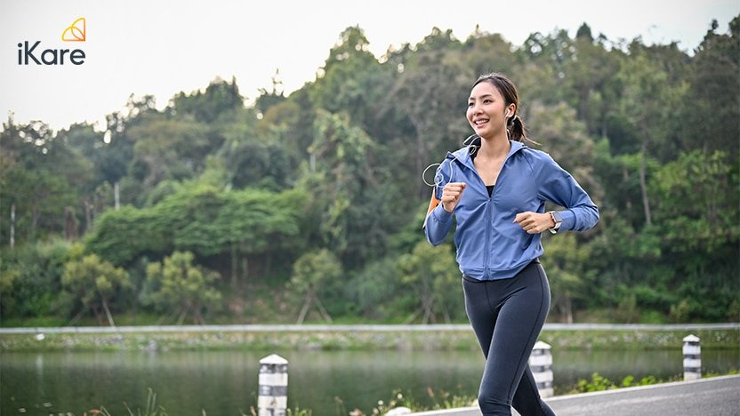 Woman Listening To Music While Running