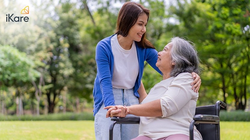 Young Caregiver Nurse Support Senior Older Female