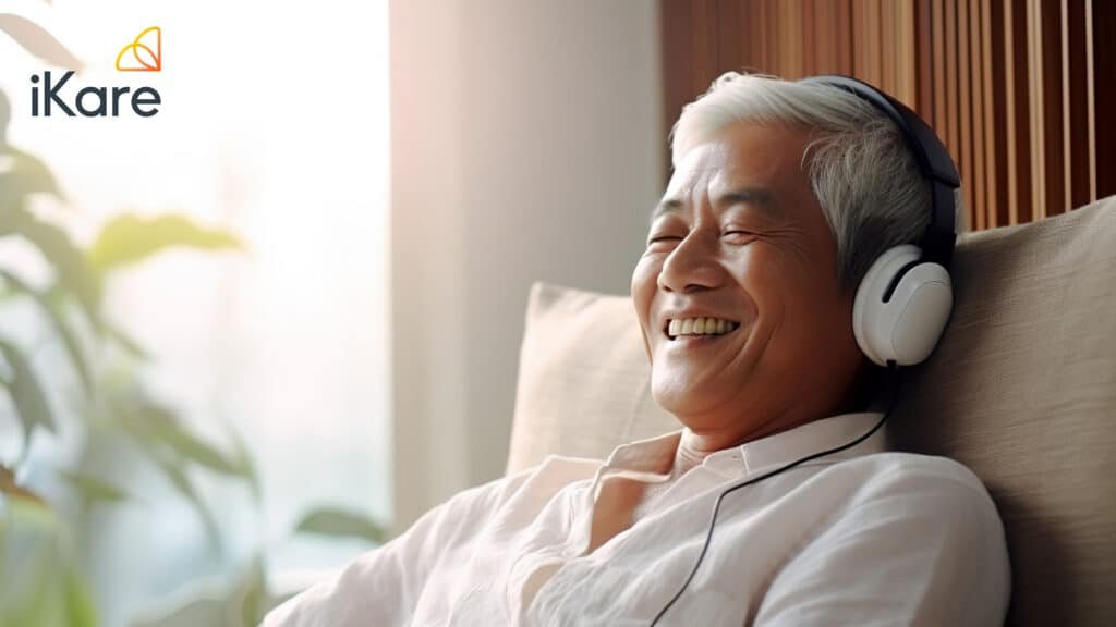 Senior listening to music at home